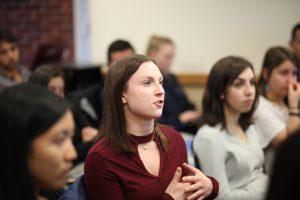 Woman speaks in audience.