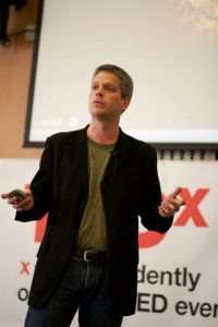 Rowswell speaks at a TEDx conference about Open Source Democracy Promotion.