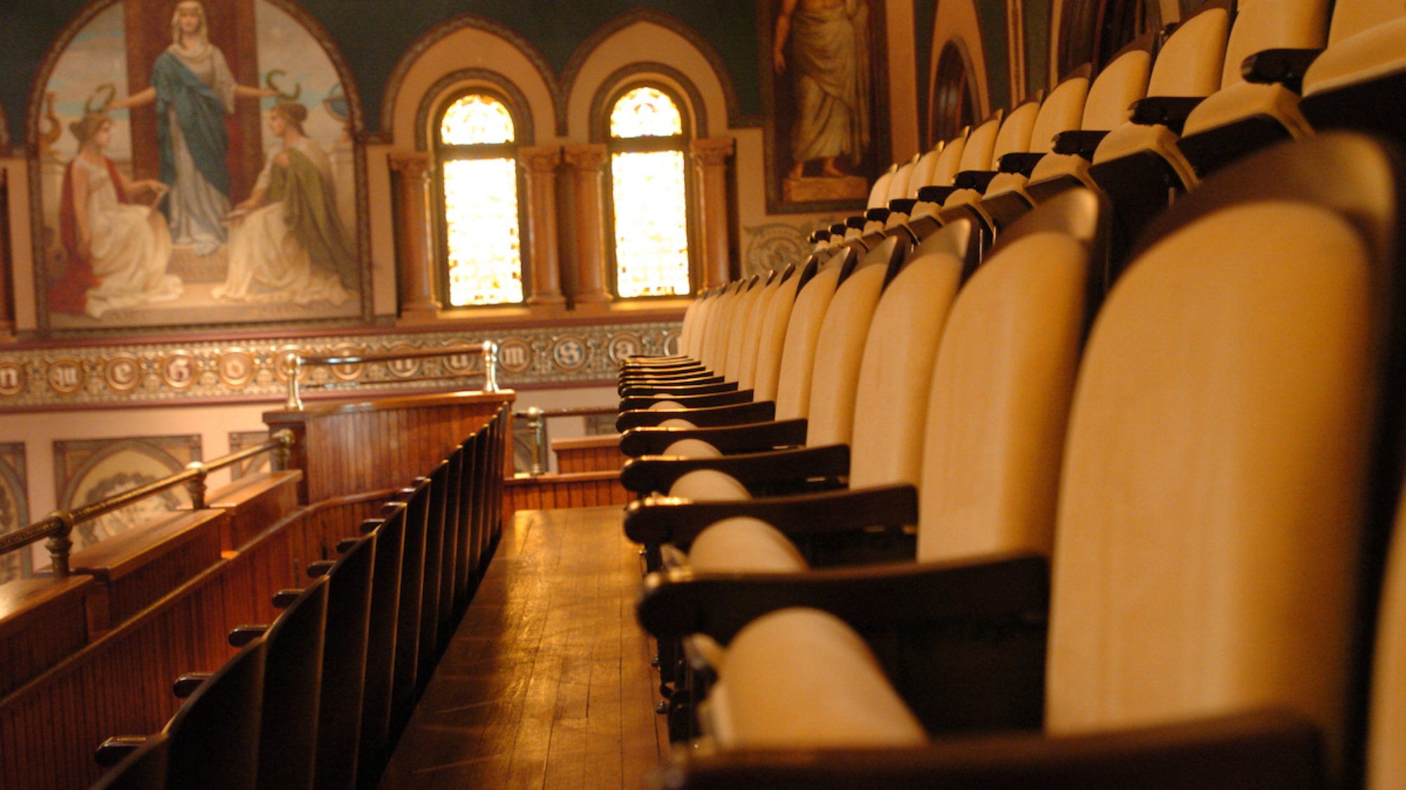 Healy Hall seats with rose windows in background