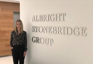 Freddy Kaiser posing in front of Albright Stonebridge Group