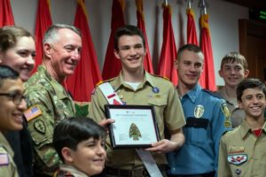 Lt. Gen. Gary handing out certificate to boy scouts