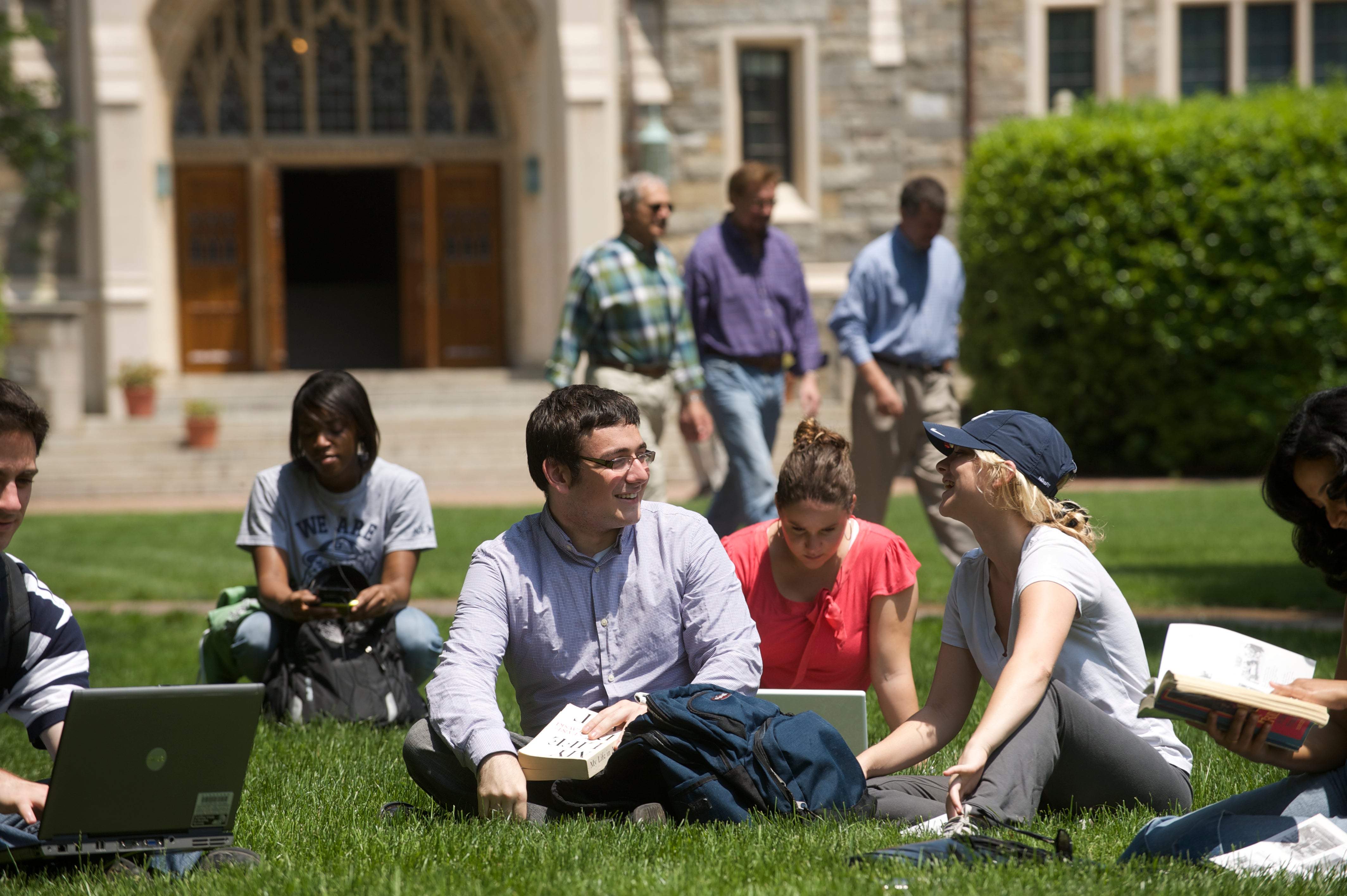 Undergrad students on lawn
