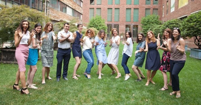 Group of people pose for a photo.