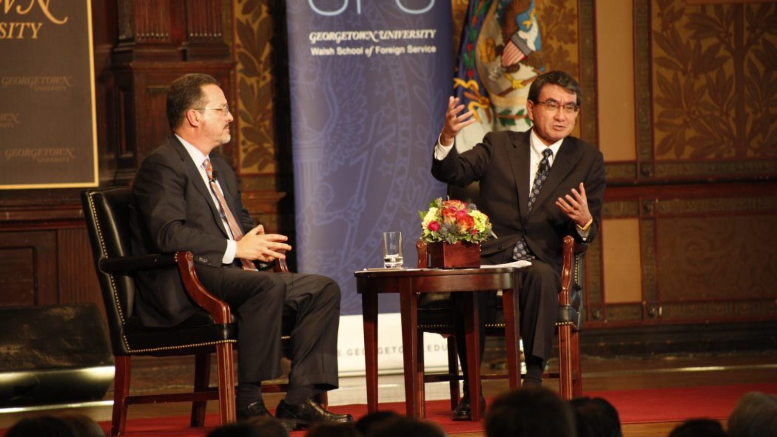 Foreign Minister of Japan speaking with Dr. Michael Green, Director of Asian Studies
