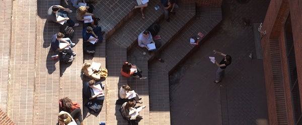 students sitting on stairs