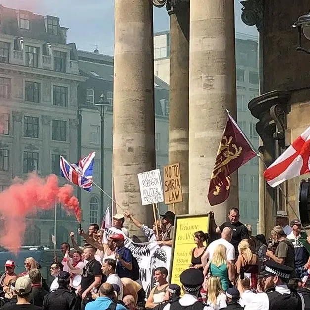 A crowd of people gathered in political unrest within the United Kingdom.
