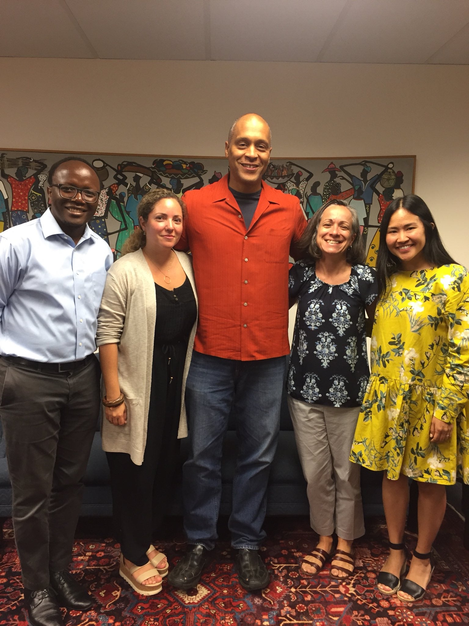 Smith surrounded by African Studies Program faculty and staff, including former Director, Prof. Scott Taylor.