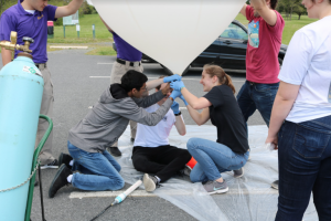 Laura Ratliff working on the high altitude balloon.