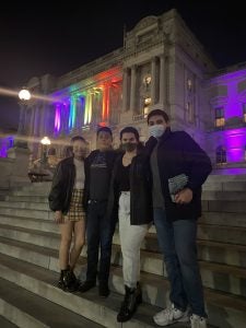 A photo of Sam and a few friends, also members of NASC, standing on the steps of a museum or government building.