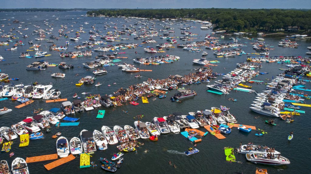 Photo of a lake crowded with boats.
