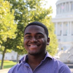 Terrence Armstead poses in front of Washington's Capitol building