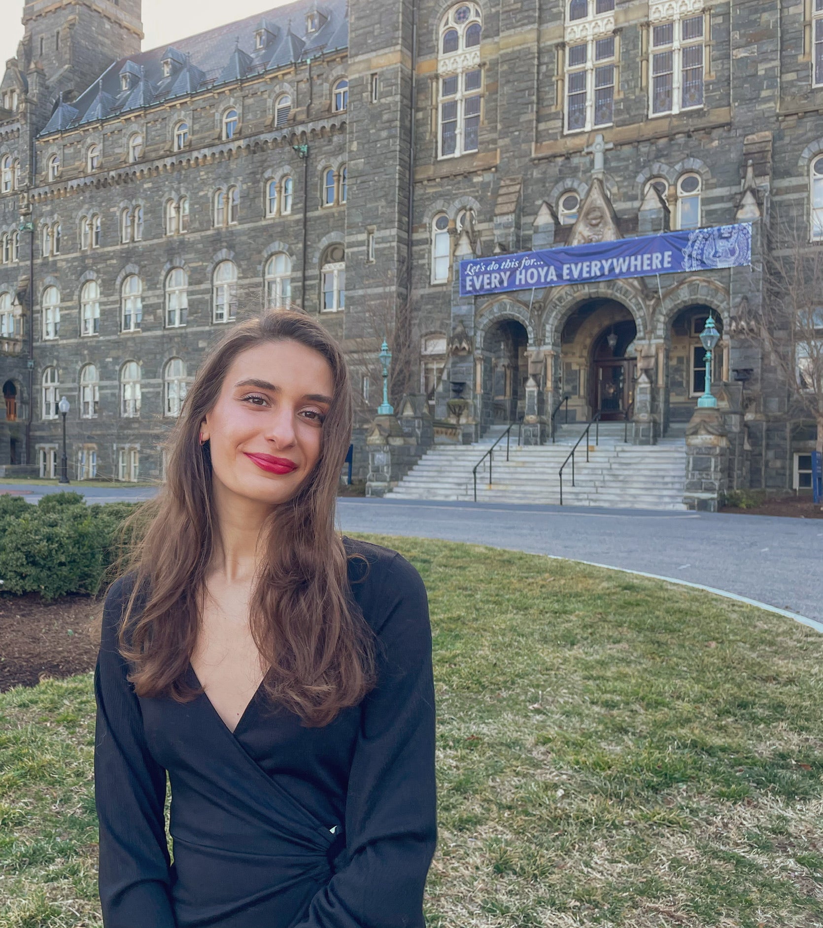 Dolbaia poses in front of Georgetown's Healy Hall.