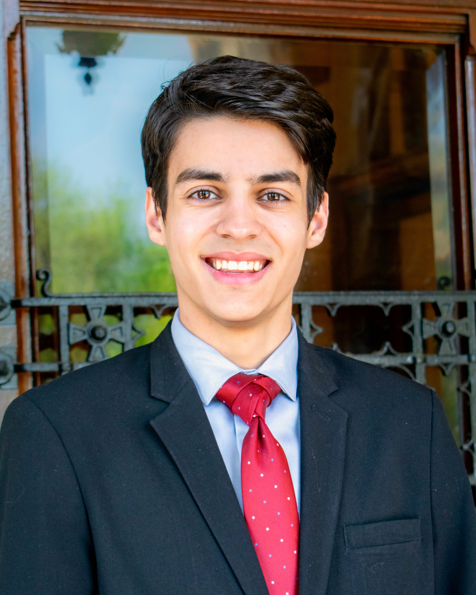 Lobo Koerich pictured shoulders up in business attire.