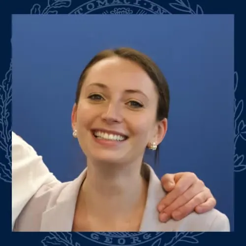 Headshot of Vanessa Jarnes in gray blazer with hair pulled back.