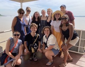 The Centennial Lab class smiles on a ferry to the other side of Phnom Phen.