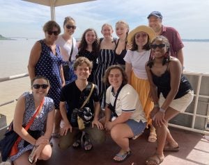 The Centennial Lab class smiles on a ferry to the other side of Phnom Phen.