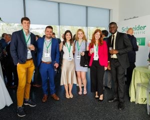 Laura Rockefeller (center) takes a photo with other interns