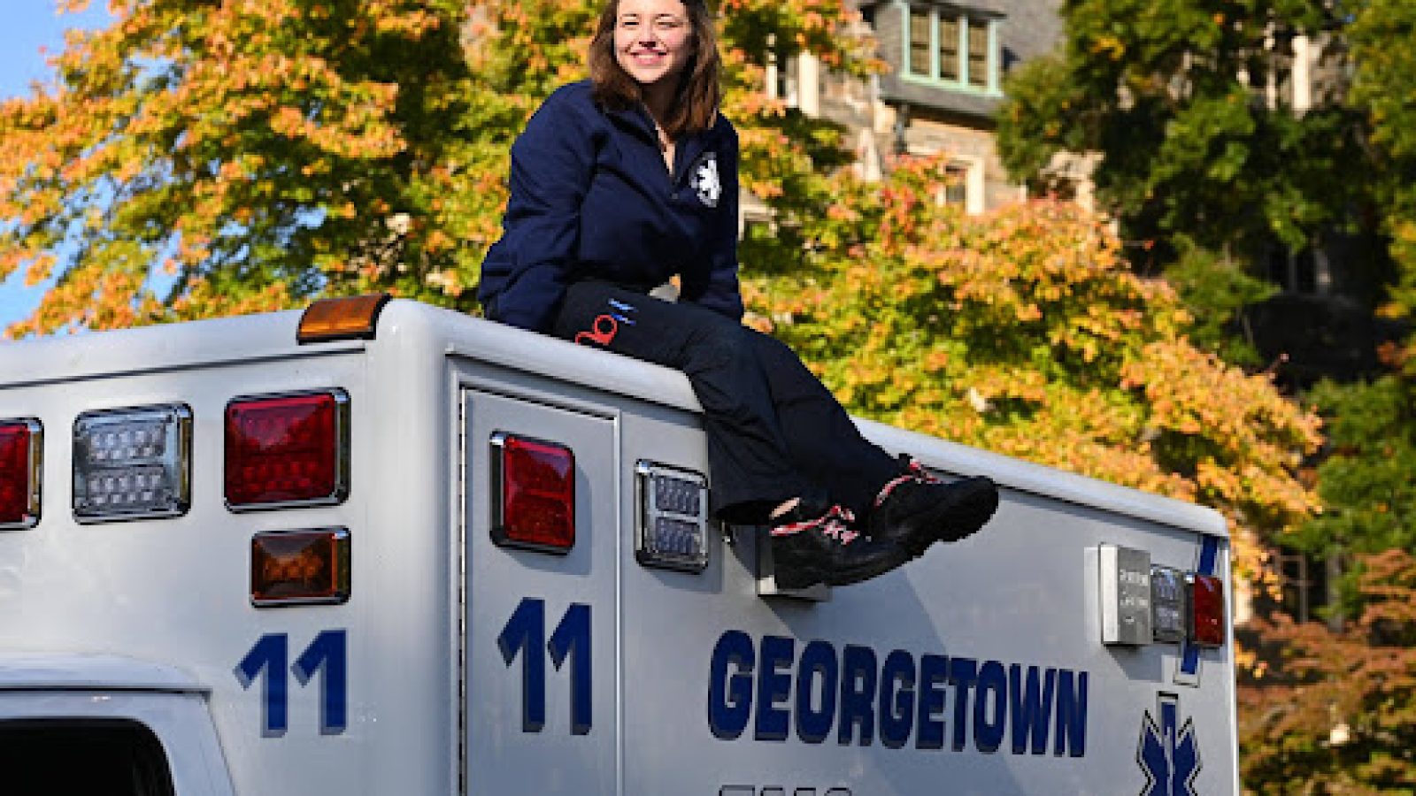 Isabella aTurilli sitting on top of GERMS amubulance