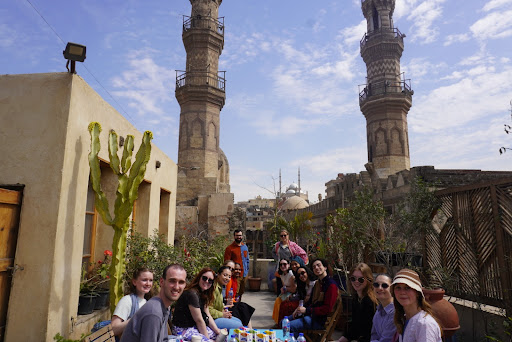 Georgetown students sitting on a rooftop in Egypt.