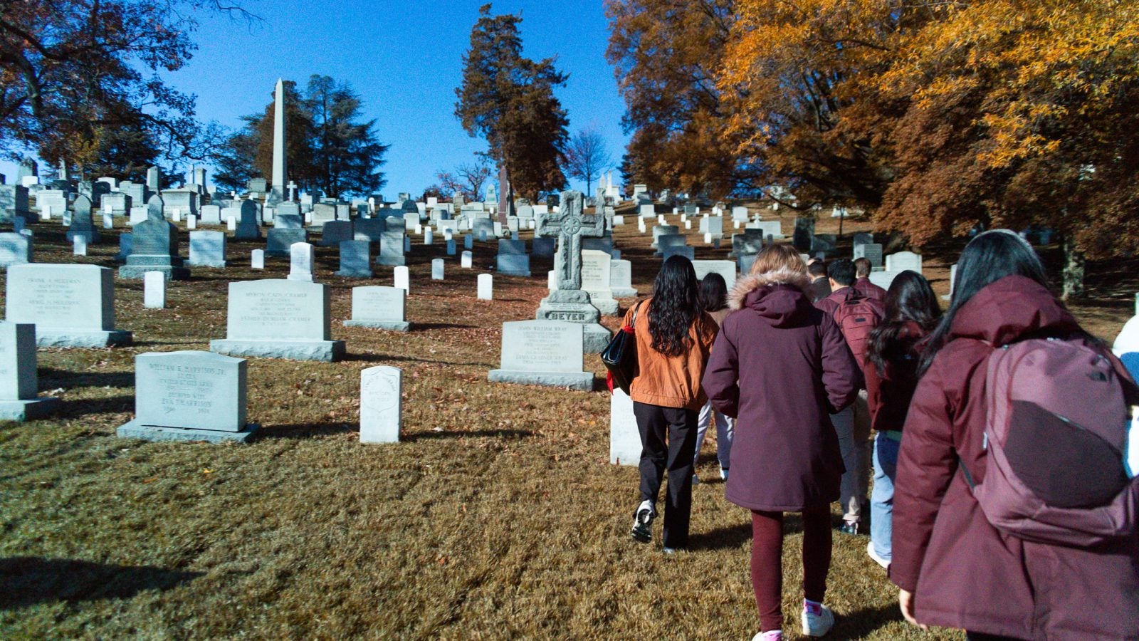 SFS students walk through the graves at Arlington National Cemetery.