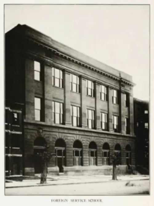 Archival black and white photograph of the Foreign Service School in the 1920s showing a brick building.