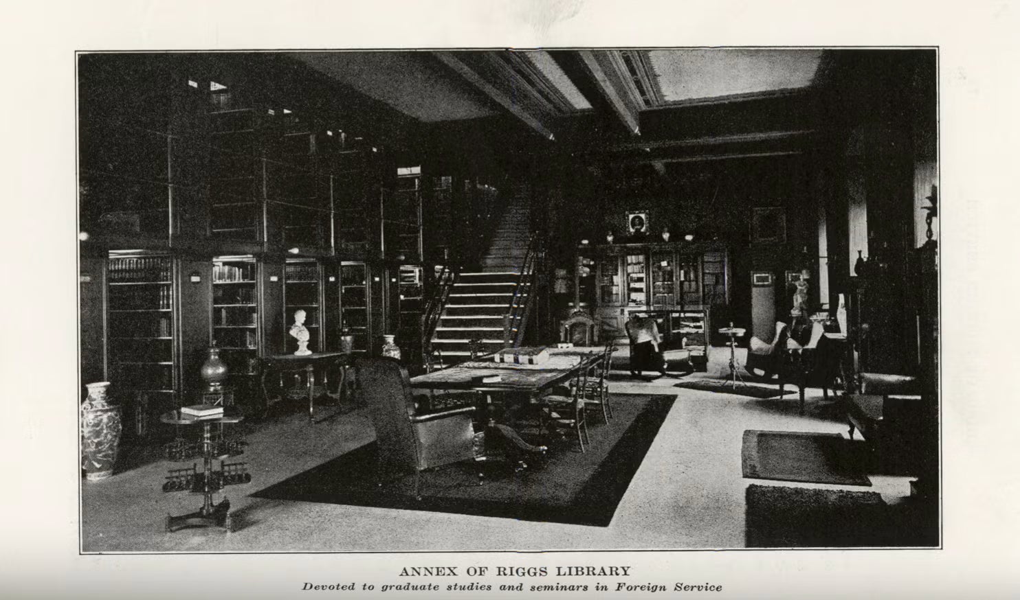 Archival black and white photograph of a library. Text: Annex of Riggs Library - Devoted to graduate studies and seminars in Foreign Service