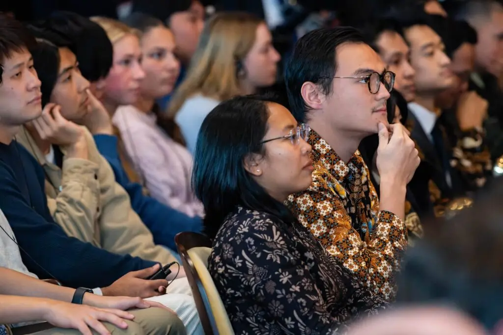 Audience members in Gaston Hall.