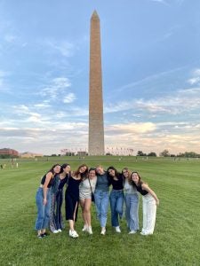 Sophia Athan and her friends in front of the Washington Monument.