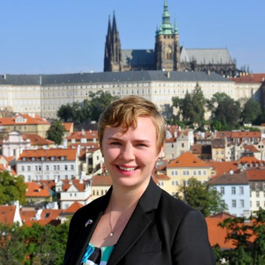 Elaine Kelly wearing a dark blazer.