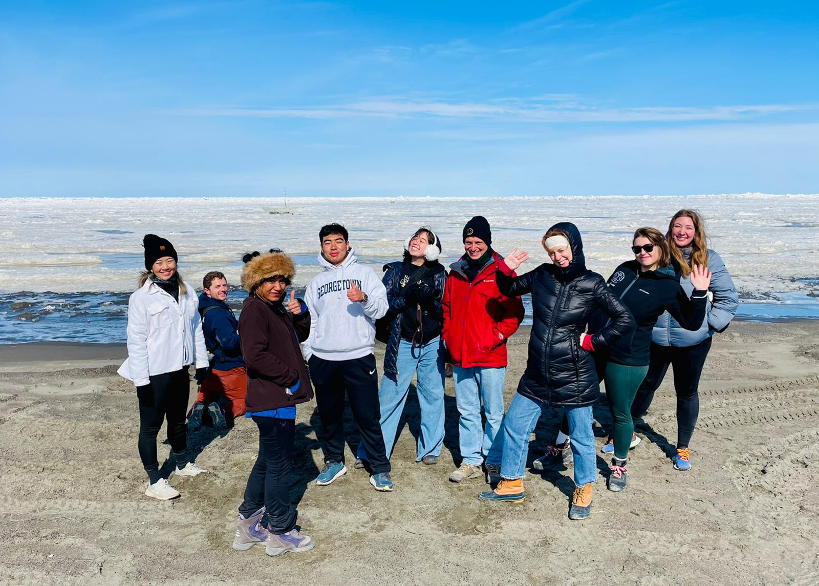 Andrew Park stands with a group of classmates wearing winter clothes in the Arctic circle.