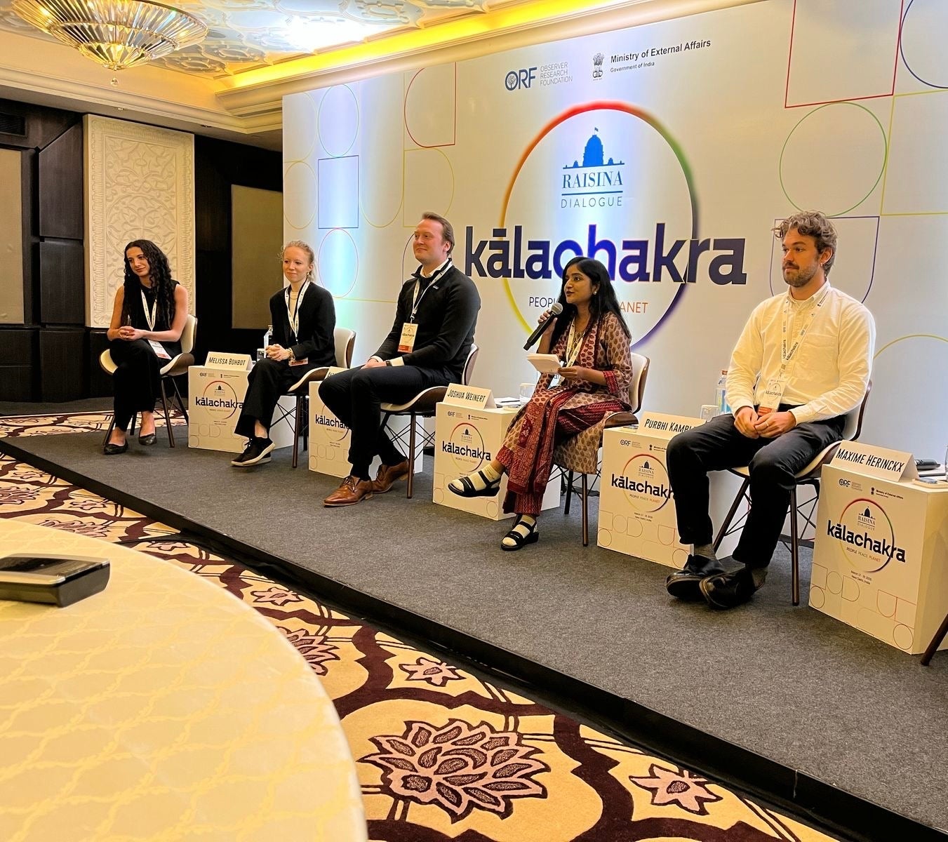 MSFS student Antonia Baskakov presents her policy proposal with her teammates at the Raisina-IE Global Competition.