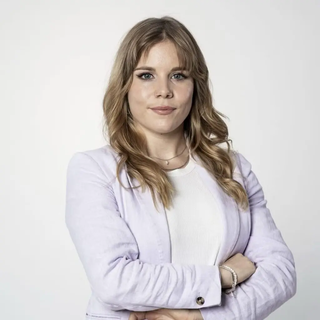 Chantal Braunwalder wearing a light purple blazer and a white blouse.