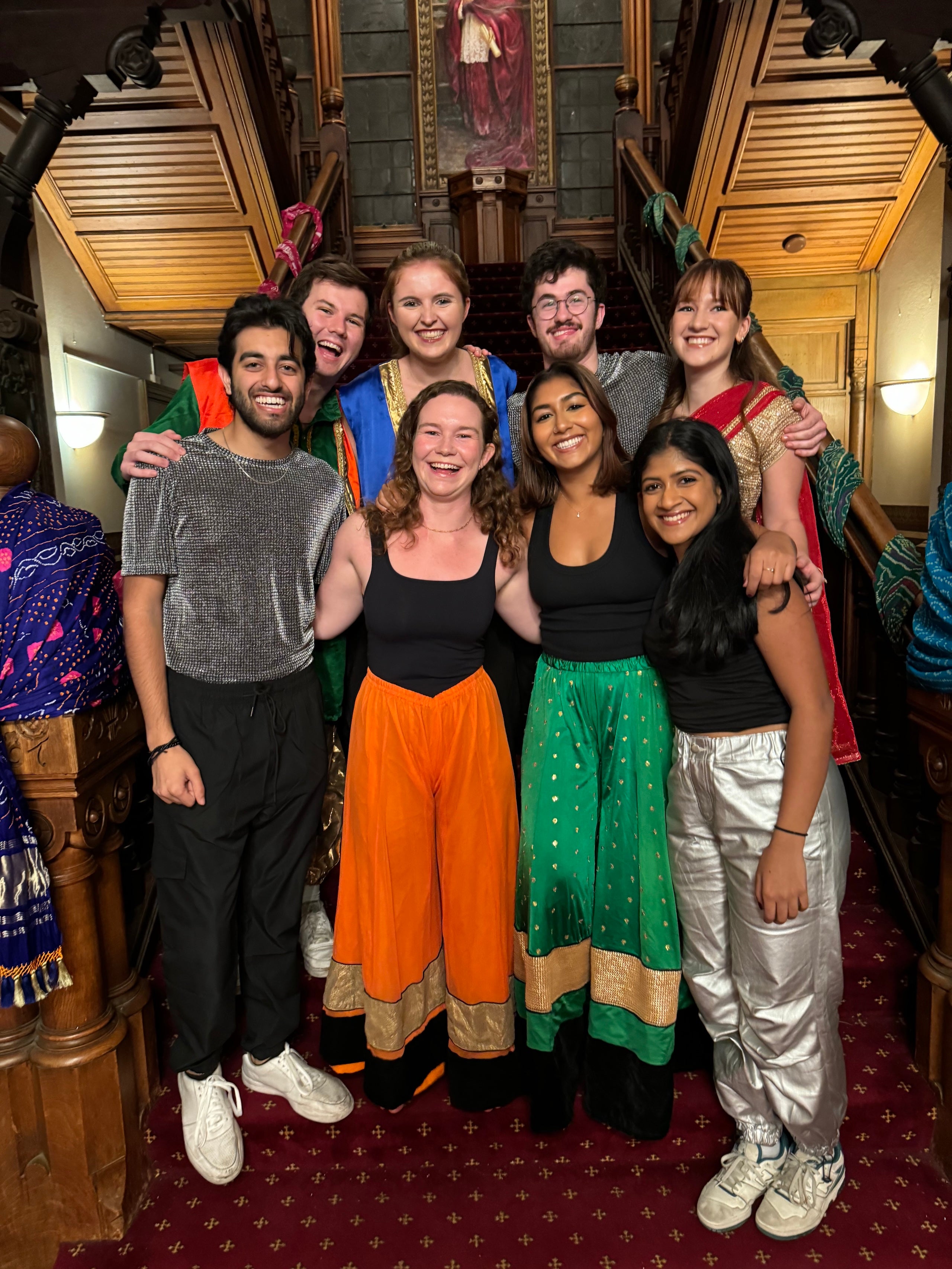 Georgie Wilson and her friends stand inside Healy Hall dressed in Indian traditional attire for the Rangila dance performance.