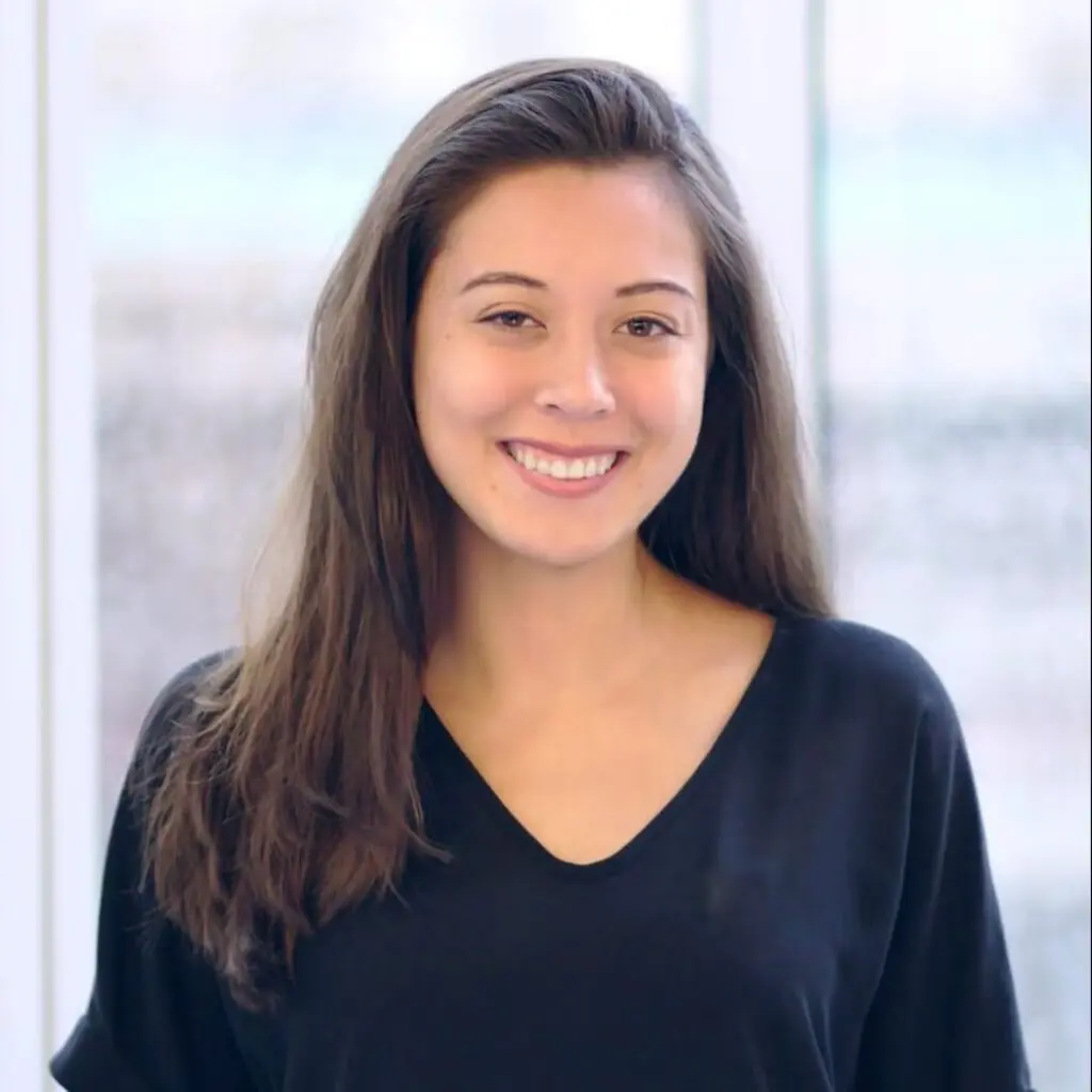 Isabelle Ick wearing a black blouse.
