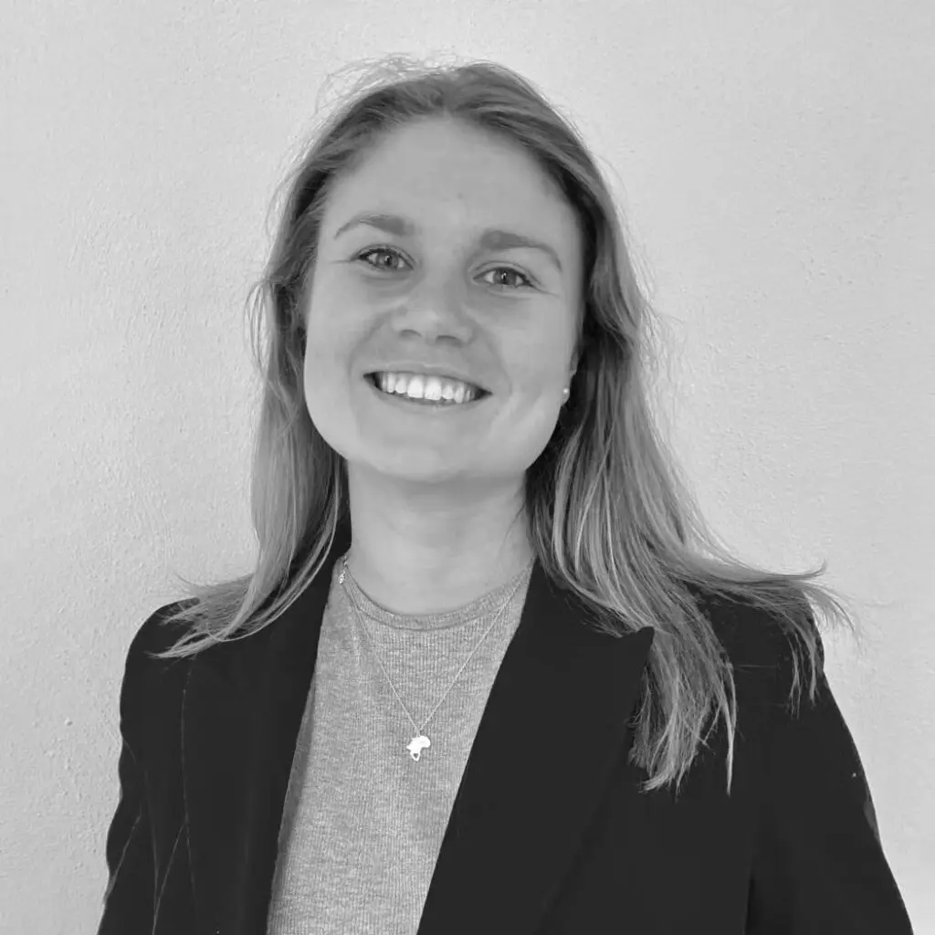 Johanna Friman wearing a dark jacket and gray shirt.