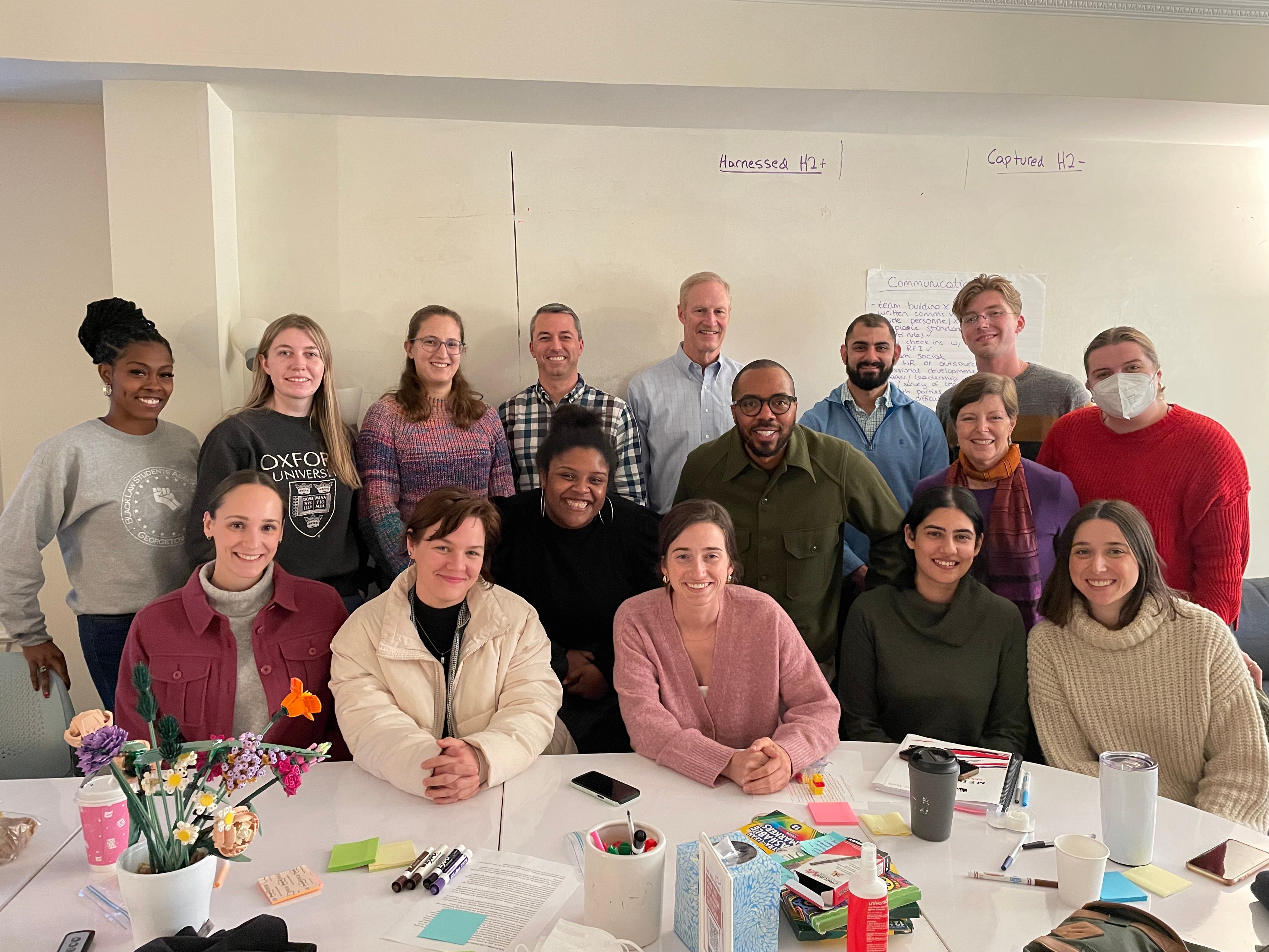 John Korban stands in the back row of a group photo with his classmates.
