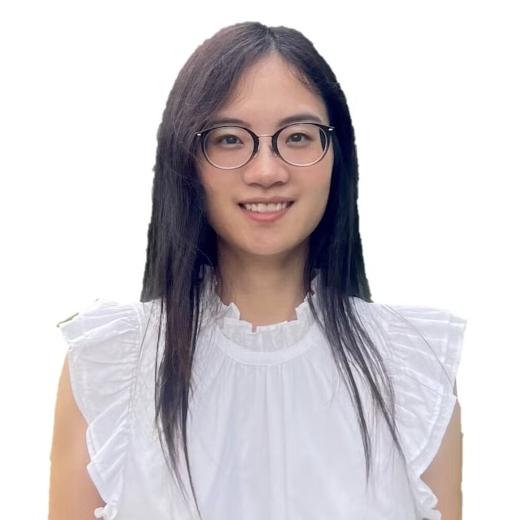 Lily Nguyen wearing a white glass and glasses.