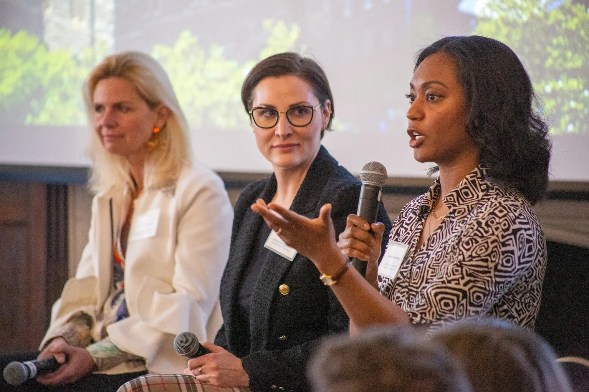 3 MSFS Alumni speaking on a panel