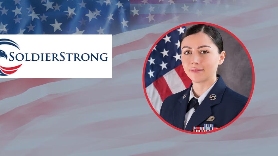 Headshot of Michaela Rubinfeld in navy blue military attire, with American flag background.