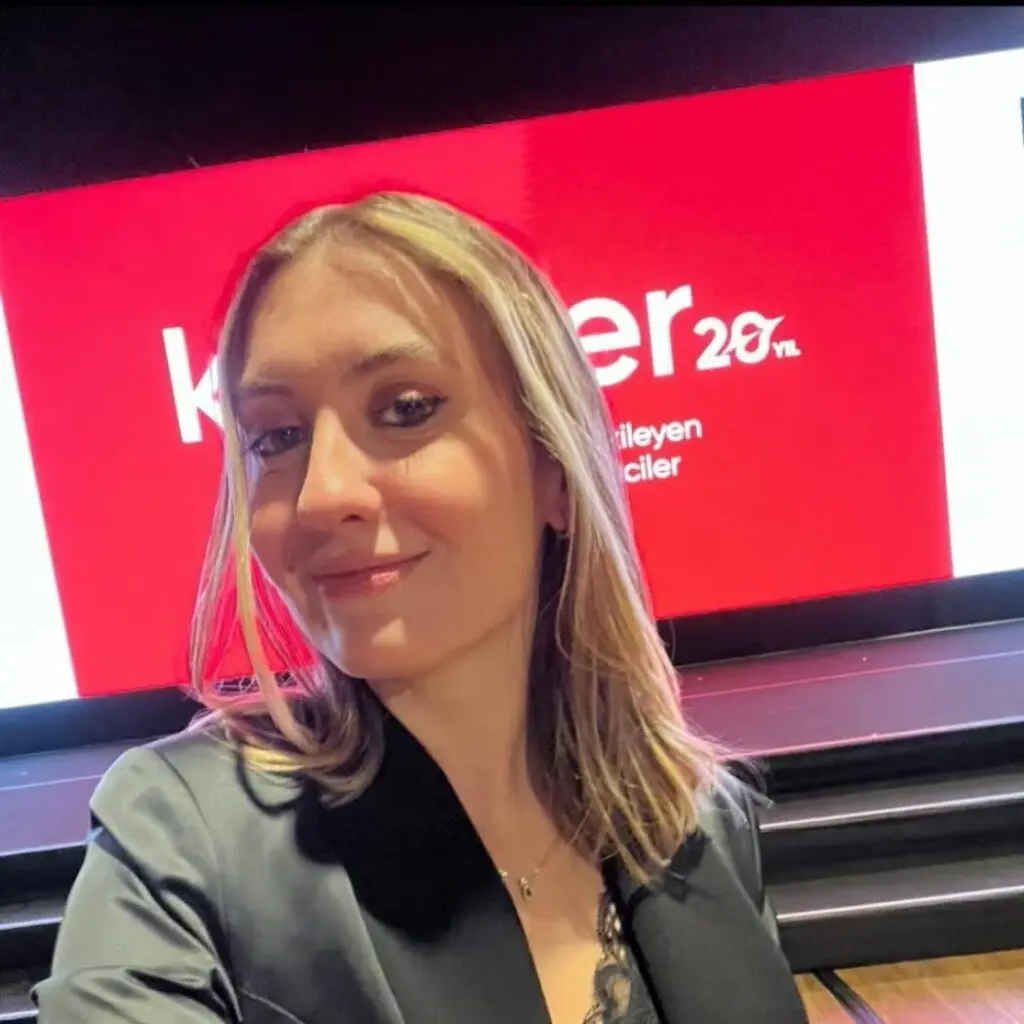 Naz Melisa Özakman wearing a black blazer.