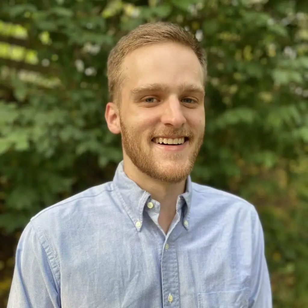 Richard Newsome wearing a light blue button-down shirt.