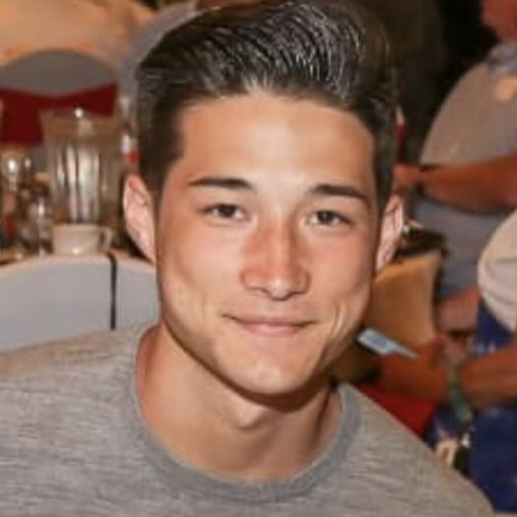 Tristin Schultz wearing a gray shirt