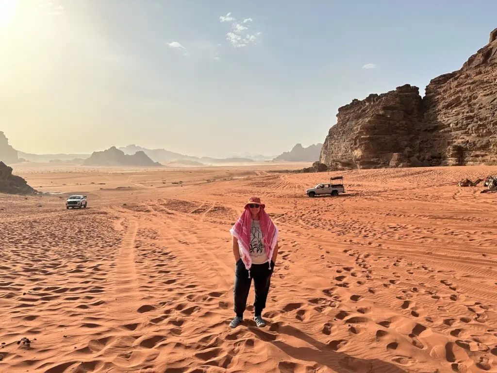 Angie Wright stands in the desert in Wadi Rum, Jordan.