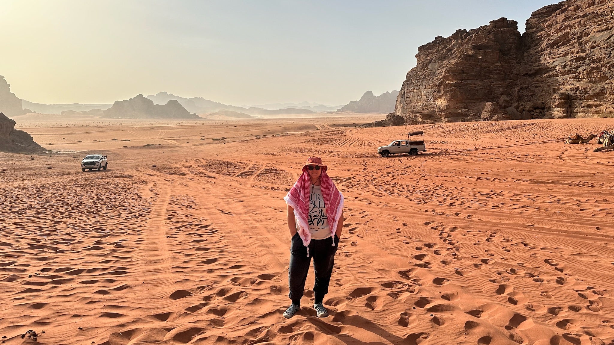 Angie Wright stands in the desert in Wadi Rum, Jordan.