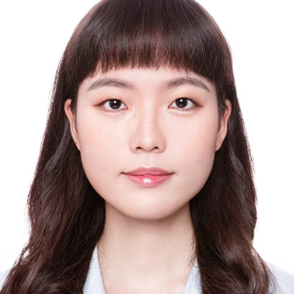 Yueh Ning Violet Chiang wearing a white shirt