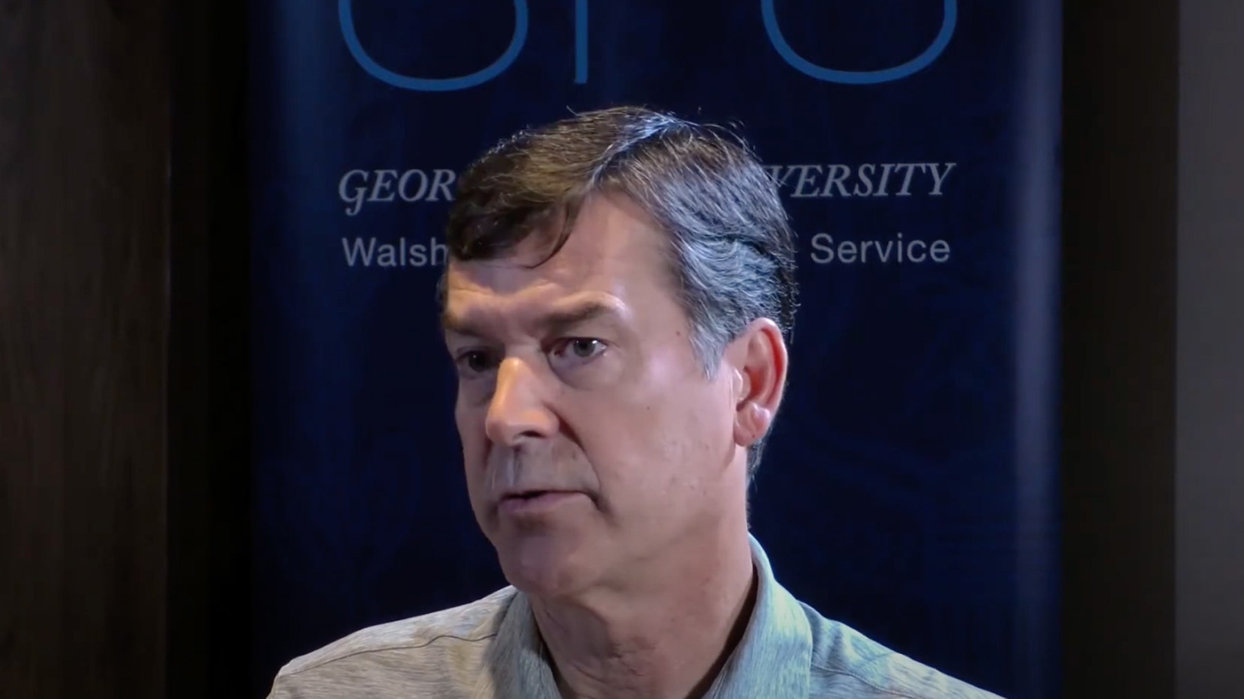 Photo of Bud Colligan speaking.