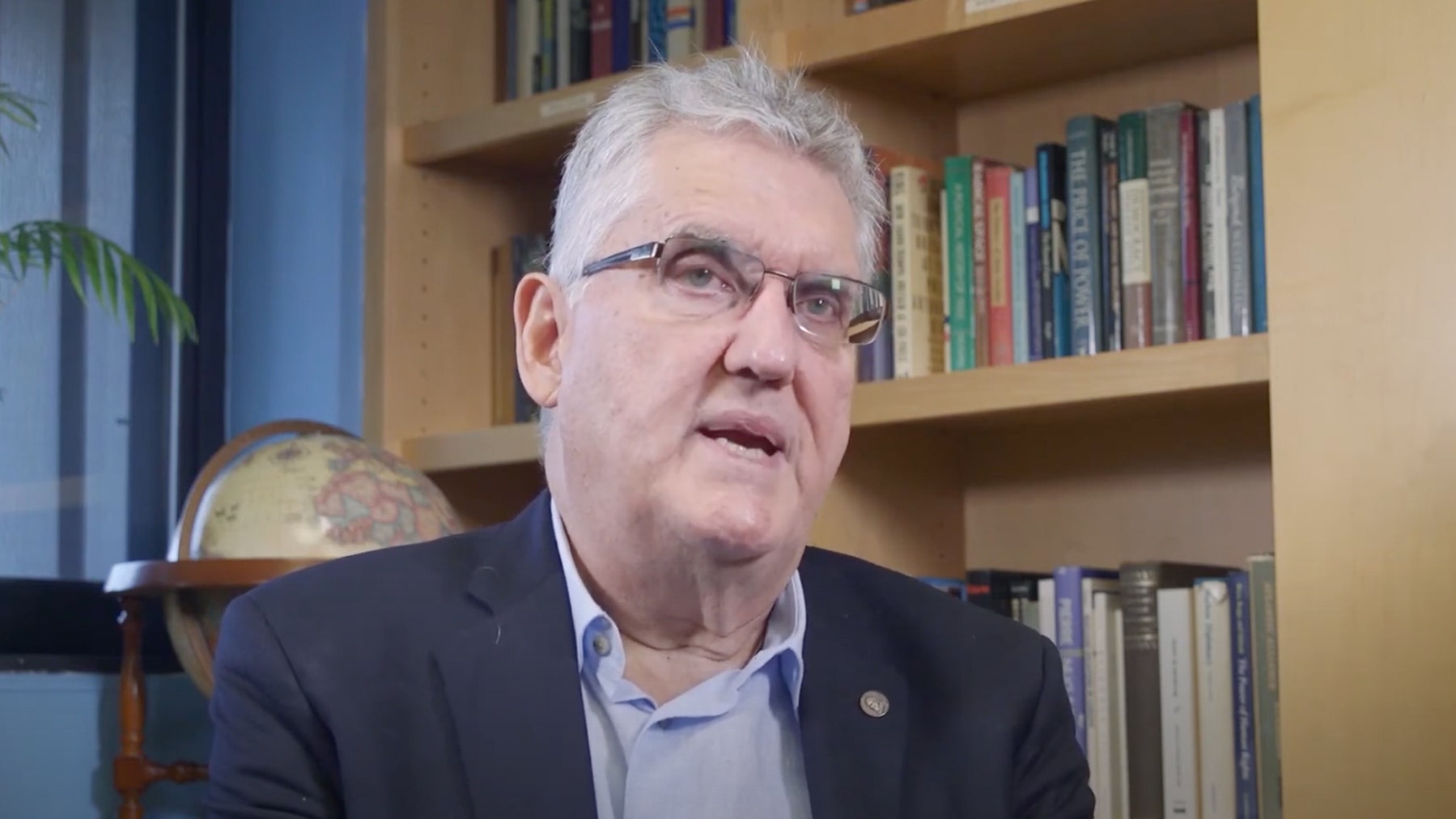Photo of Michael Karam talking.