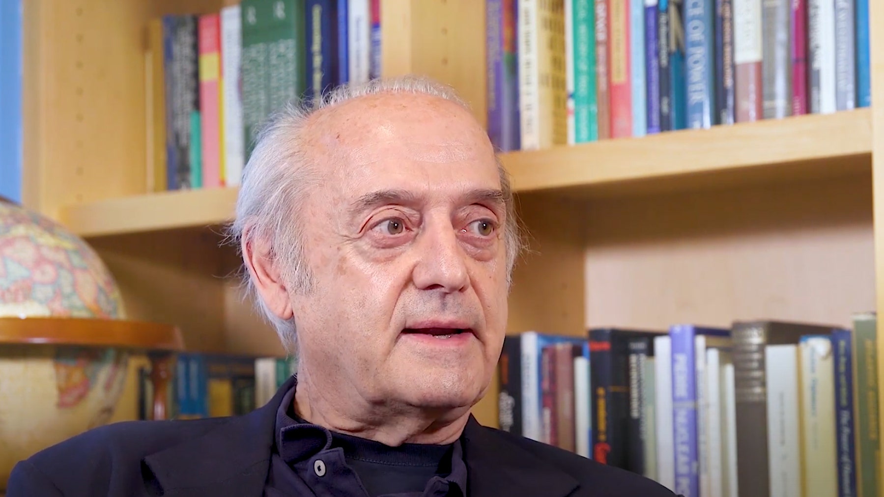 Photo of Roger Cochetti talking