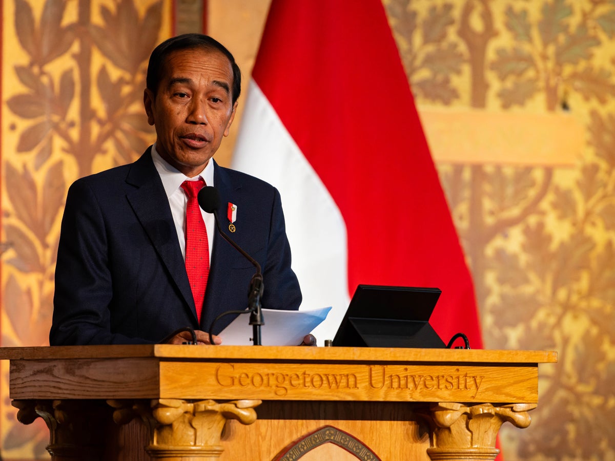 The prime minister of Indonesia giving a speech on a Georgetown University podium