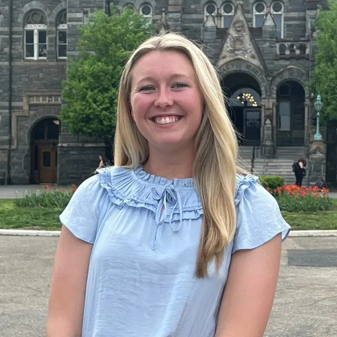 Headshot of Emily Gaven smiling at the Georgetown Campus
